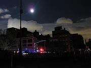  Power outage in downtown Manhattan.  A Halloween moon is illuminatiing the dark city.